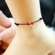Pha lê thủ công tự nhiên mã não [chống người nhỏ Wang Renyuan] dây đỏ may mắn năm nay vòng hoa sen nam lắc chân vàng trắng
