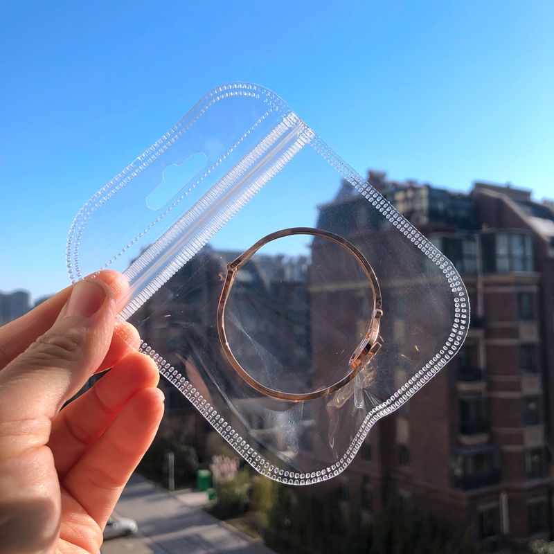 Full transparent with hanging hole Ornament Packing Bag Cashier Bag Small Items Collection Handwatch Bag Sealed Bag SELF-PROCLAIMED BAG LOCK CATCH