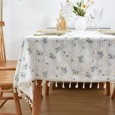A Japanese-style coffee table fabric with a light luxury and high-end feel, featuring a fresh and delicate floral pattern and small daisies