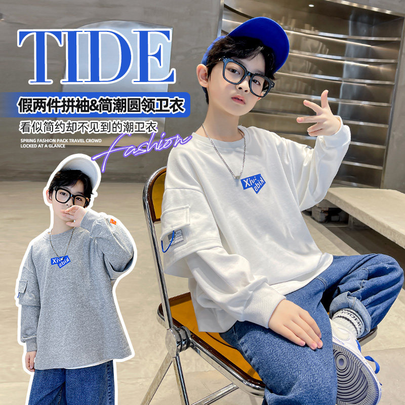 Boys sweater 2022 new spring and autumn fashionable fake two-piece stitching Western style white middle-aged children's bottoming shirt