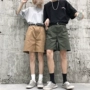 Mùa hè Hàn Quốc tại Harajuku bf retro màu rắn hoang dã dụng cụ giản dị quần short nam và nữ thẳng chân rộng năm quần s shop thời trang nữ