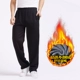 Mùa thu và mùa đông quần màu rắn nam cộng với phân bón XL quần thể thao cotton thêm quần rộng lớn cộng với quần nhung nam chất béo quần áo nam hàng hiệu