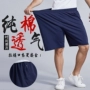 Mùa hè chất béo quần short cotton nam dệt lỏng kích thước lớn giản dị cộng với phân bón để tăng đàn hồi thể thao quần năm điểm bãi biển quần nam