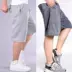 [Mua một tặng một] quần short nam mùa hè năm quần cộng với phân bón XL thể thao đi biển quần rộng béo jogger nam Quần short