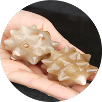 Natural horn hand playing fitness handball massage health care golfer dribbling hand turning ball training playing old man holding the ball