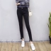 Quần skinny rách của phụ nữ mùa thu mới Hàn Quốc cao eo thon đen quần cắt cạp co giãn chân bút chì quần quần áo nữ giá rẻ Quần jean
