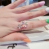 Tình yêu châu Âu và Hoa Kỳ nhỏ tươi nhân tạo hoa opal ngón tay nhẫn phiên bản Hàn Quốc của nhẫn trang sức thủy triều điều chỉnh kích thước nhẫn cặp bạc Nhẫn