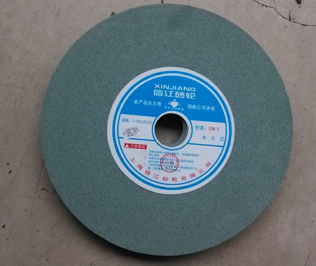 Xinjiang ຖ່ານກ້ອນ corundum grinding wheel ສີຂາວ WA ເຫຼັກ jade ເຫຼັກສີຂາວ jade ເຫຼັກ grinding 350*40*127