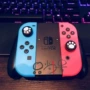 Trò chơi video sáng tạo Nintendo chuyển đổi máy chủ lưu trữ NS máy chơi game cầm tay Zelda Mario Odyssey tay cầm chơi game xbox