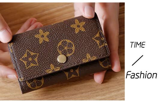 2018 mới châu Âu và Mỹ retro cao cấp xe chìa khóa túi xách nữ chìa khóa túi chìa khóa thẻ nam đa chức năng ví móc chìa khóa nữ