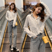 Design sense vertical stripe shirt womens spring and summer 2021 new Korean version wild Hong Kong style early spring long-sleeved very fairy shirt