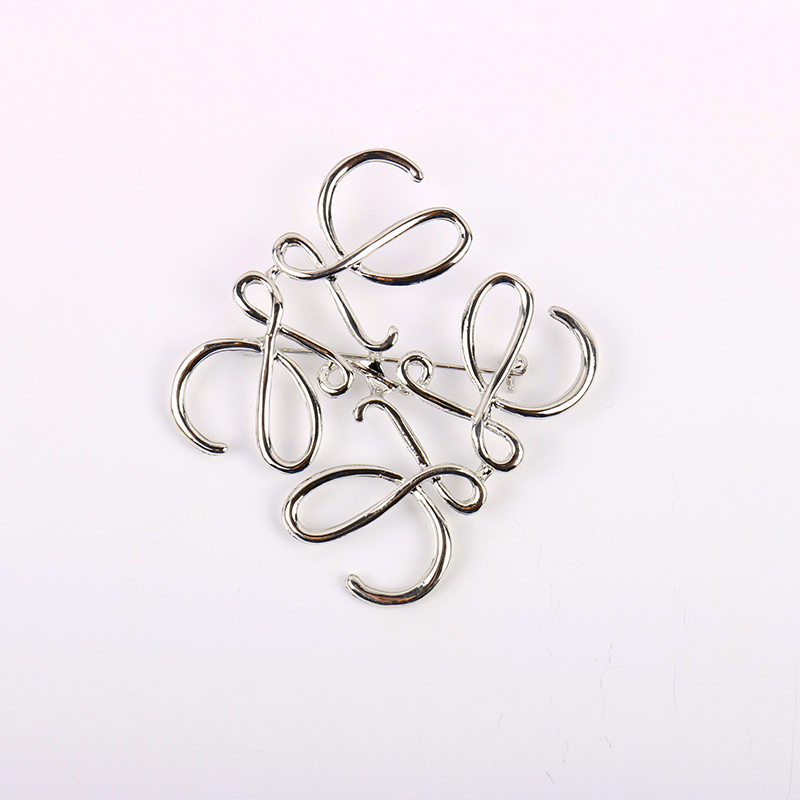 Minimalist cổ điển trâm nghệ thuật trừu tượng thiết kế khí chất hoang dã với áo khoác trâm rỗng unisex - Trâm cài trâm hoa cài áo