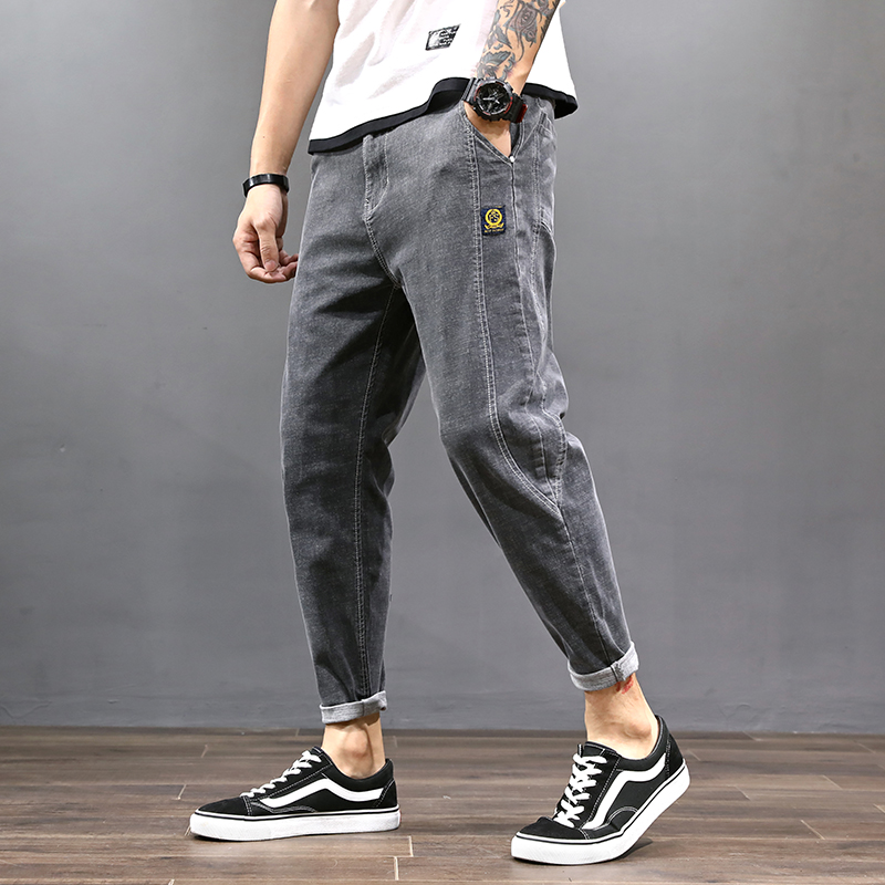 Summer men's thin style jeans Men's wave cards casual narrow footed pants Korean version Trend 90% loose straight drum pants men