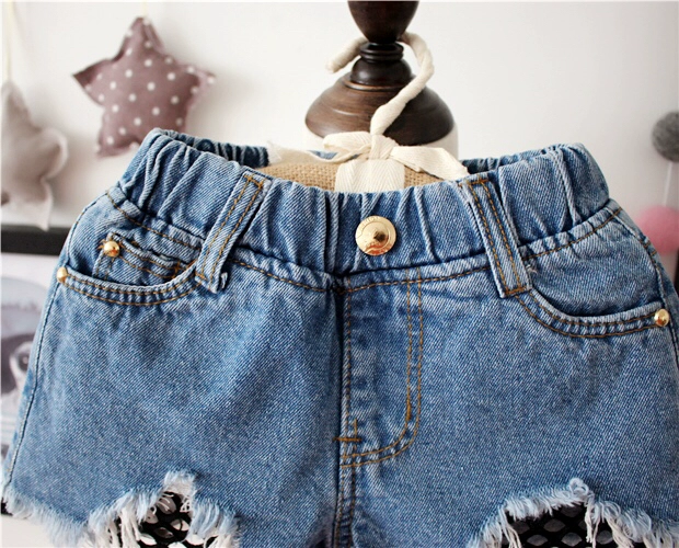 Cô gái mùa hè Hàn Quốc phiên bản của quần short denim lỗ thời trang trẻ em mặc hoang dã loose lưới hot quần quần lót trẻ em