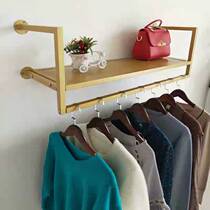 Clothing store display rack on the wall Childrens clothing shelves decorative mens and womens clothing Wrought iron wall hangers display side hanging positive hanging