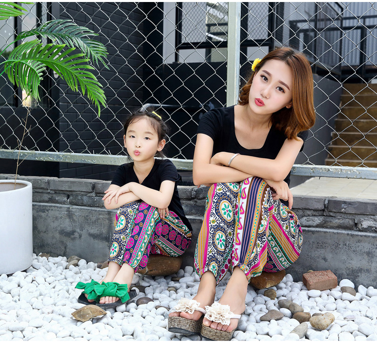 Mẹ mùa hè váy cha mẹ và con nạp bông lụa quần bãi biển nhân tạo cotton silk cây ra hoa Thái in cao eo nữ quần váy đầm tuổi trung niên