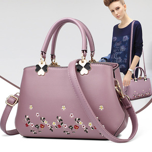 2019新款时尚刺绣手提百搭单肩斜挎包