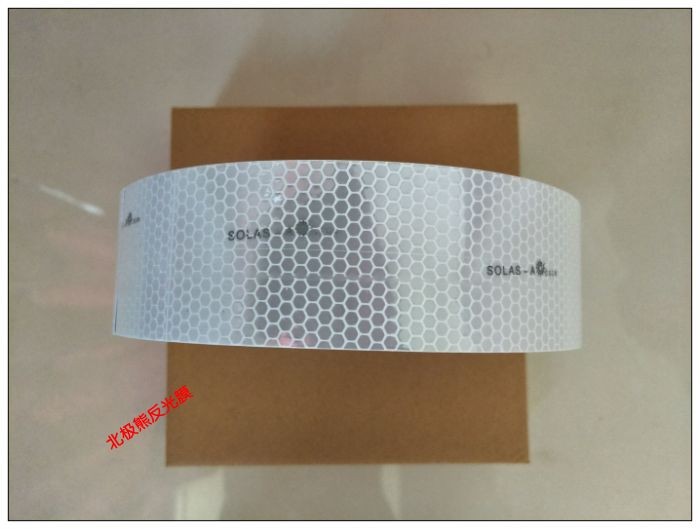 Marine film Maritime with Lifebuoy Marine SOLAS glistening with silver grey honeycomb-shaped reflective strips