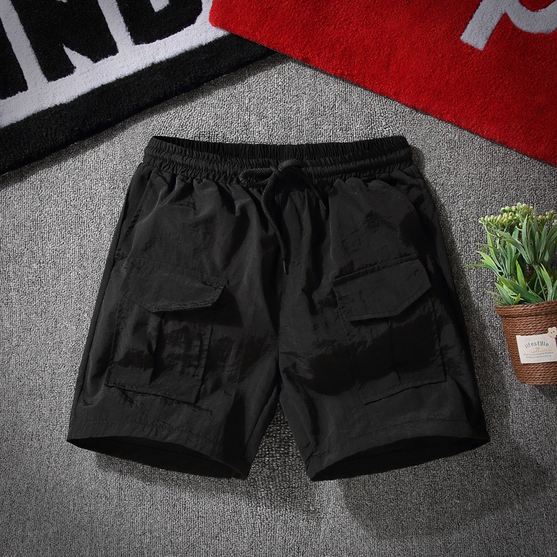 Nhanh tay với người đàn ông với quần short nam siêu xã hội tinh thần anh chàng ba quần xu hướng quần đi biển giản dị quần áo nam