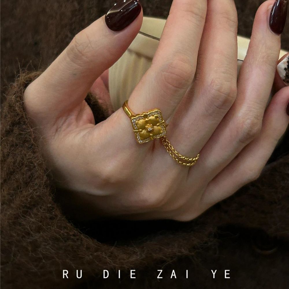 Kuning vintage middle-aged cloth Qifeng four-leaf ring light luxury high-end pull adjustable autumn and winter ring