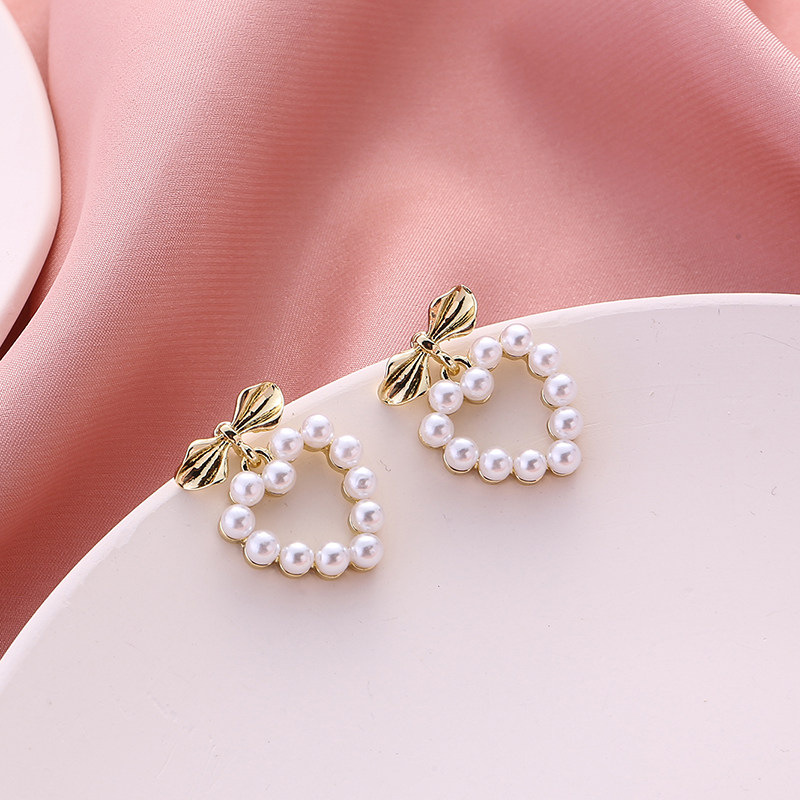 women's sweet love pearl earrings in japan and korea net red simple bow stud earrings without hole earrings