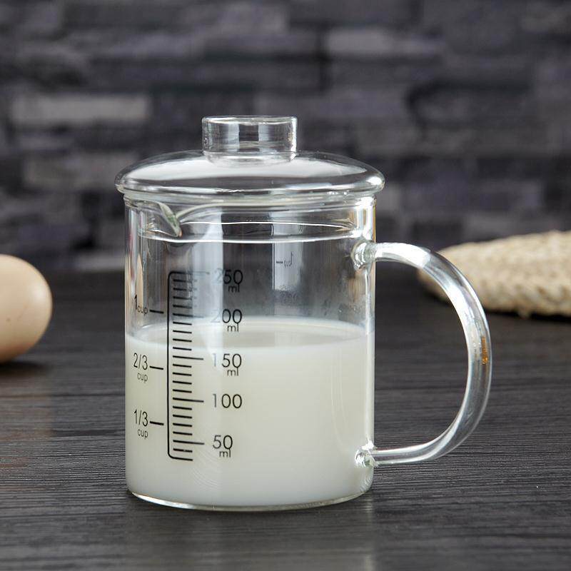 Tea cup glass with a glass of milk glass with a gram of freshener with keratness, baking hot miller metering cup