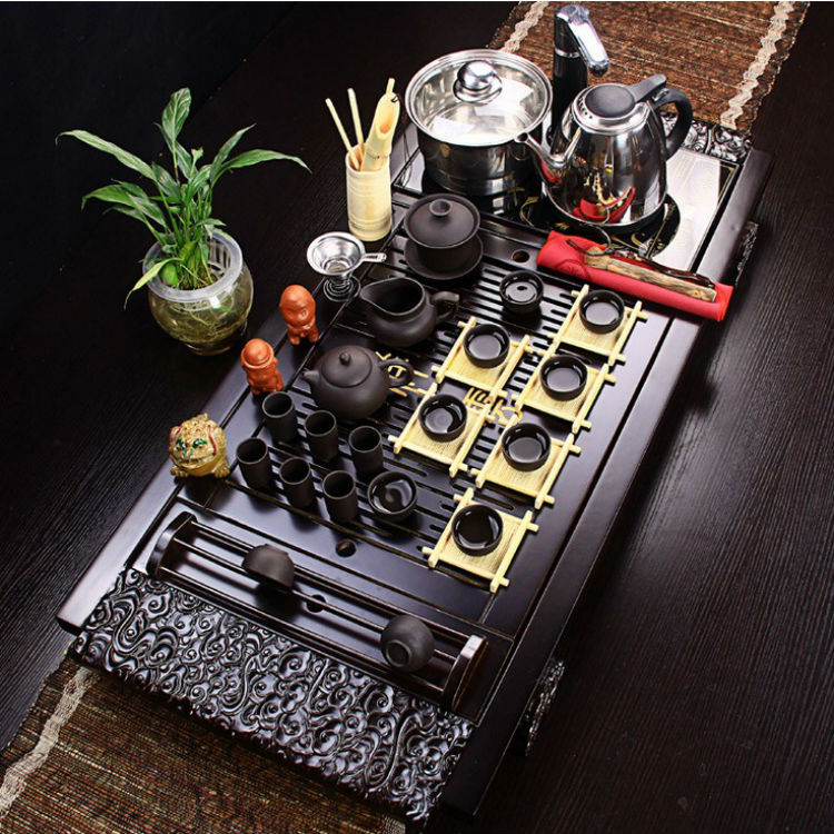 Tea set Special price Purple Sand Kung Fu tea set Four-in-one induction cooker Xiangyun Ke Mu Solid Wood tea tray Tea Sea