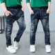 Quần jeans bé trai Mẫu mùa xuân hè 2018 quần trẻ em phiên bản Hàn Quốc của quần dài cho bé lớn cộng với quần nhung chân hoang dã