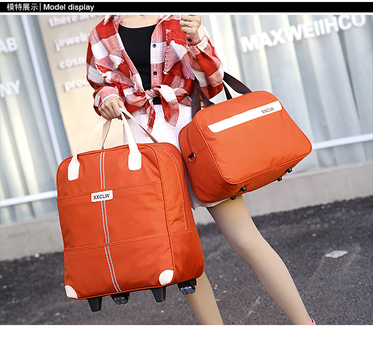 Xe đẩy túi du lịch túi nữ túi duffel xách tay công suất lớn nam tay ngắn khoảng cách vành đai kéo rod được sản xuất gói nội trú túi du lịch loại lớn
