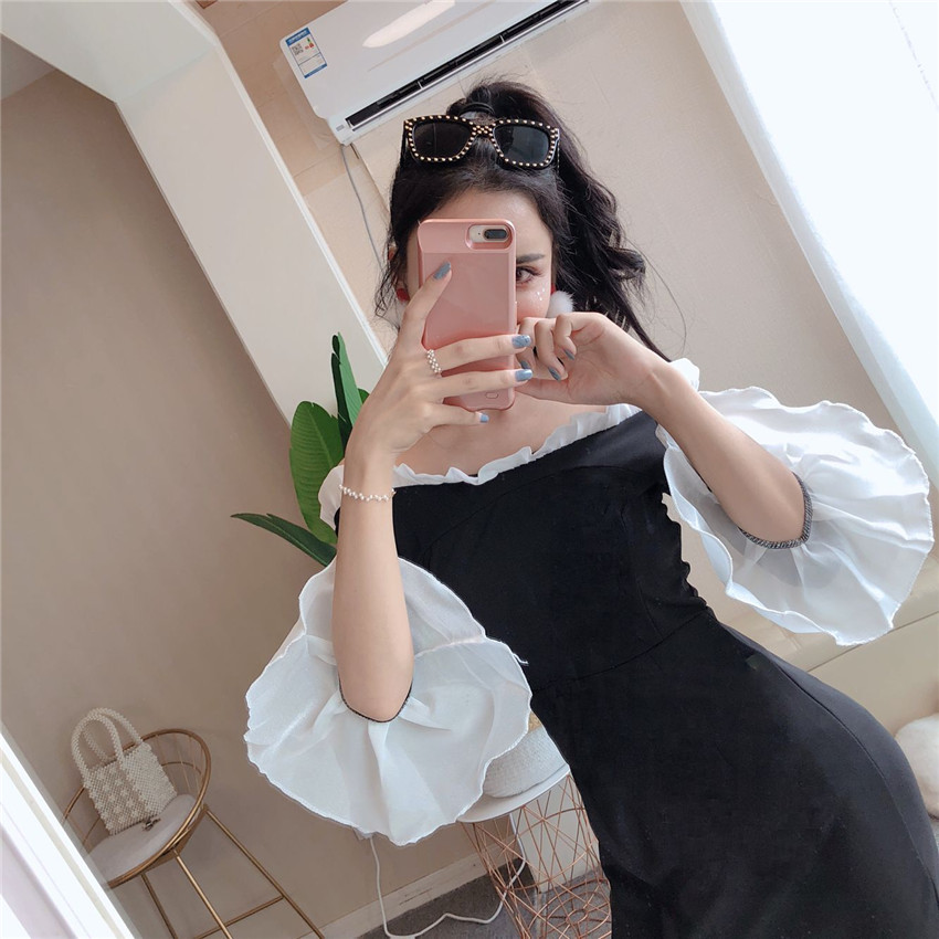 VK旗艦店 韓系性感一字領喇叭袖開叉長袖洋裝