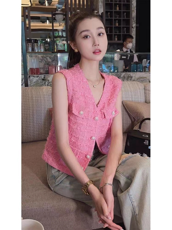 This Year's Trendy Hot Item Is a High-End, Super Stylish, Age-Reducing, Fashionable, Socialite-Inspired Pink Vest for Petite Figures