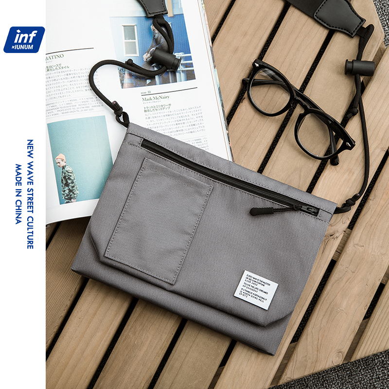 Tide brand shoulder messenger bag men's fashion all-match canvas small bag women's lightweight envelope messenger bag mobile phone ID bag