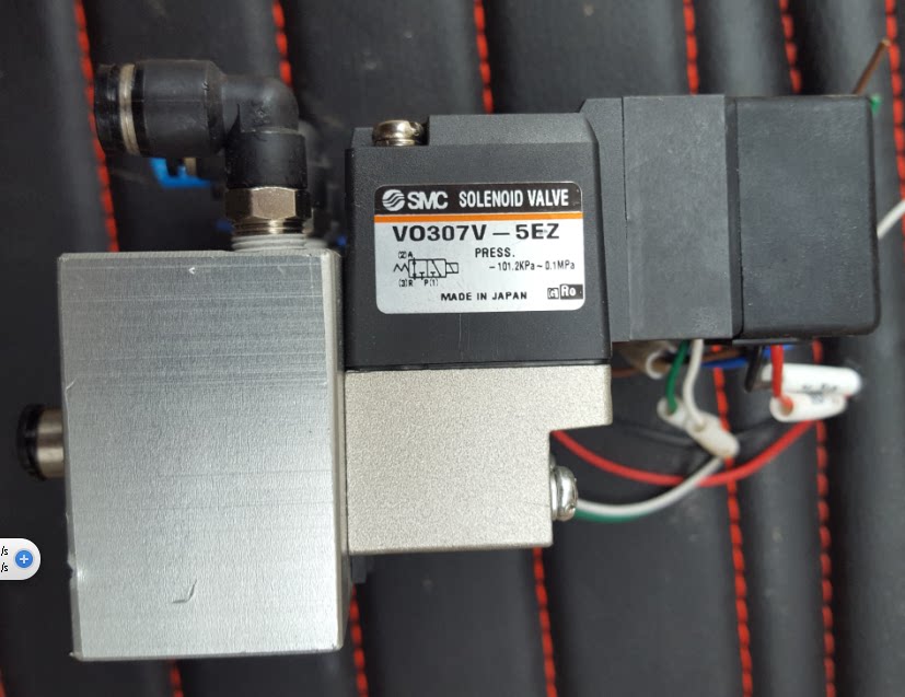Old Japanese SMC solenoid valve VO307V - 5EZ used in-hand photography