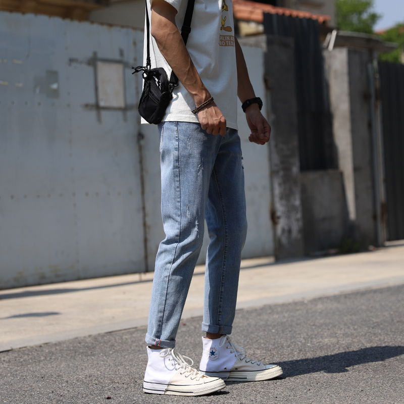 Hole denim trousers men slim small feet Japanese spring and summer new youth Korean version of the trend Harun beggar personality