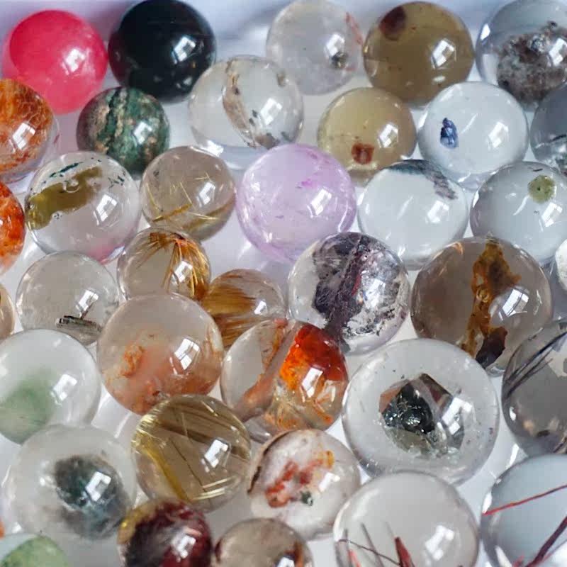 Natural water crystal ball wrap specimen red grain green ghost mica blond crystal mirror iron ore crystal garnet rabbit hair