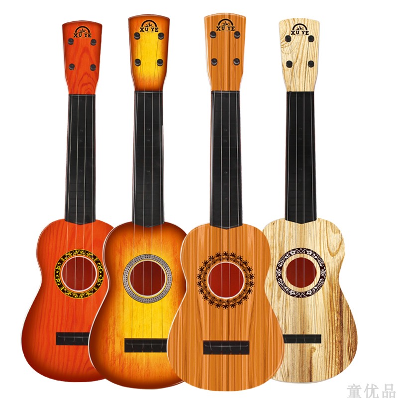 Trẻ em của cây đàn guitar nhỏ, đó là đồ chơi có thể chơi mô phỏng vừa ukulele người mới bắt đầu nhạc cụ âm nhạc để gửi picks