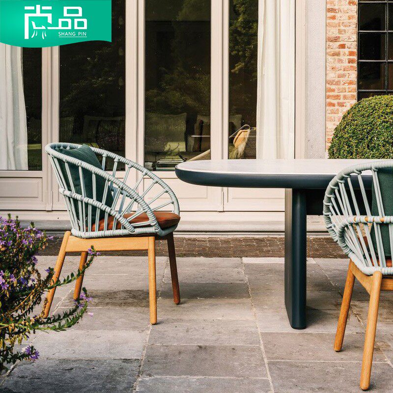 Outdoor table and chairs open-air garden rattan chair combination balcony designer creative dining chairs villa garden dining table and chair combination