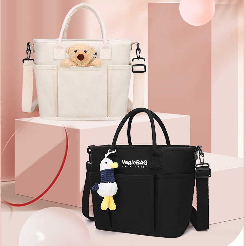 Multi-functional Korean version of mommy bag 2022 new fashion portable canvas mother and baby bag large capacity waiting bag Messenger