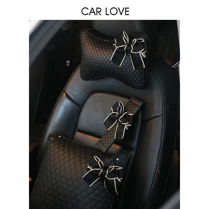 A pair of car pillows and neck pillows