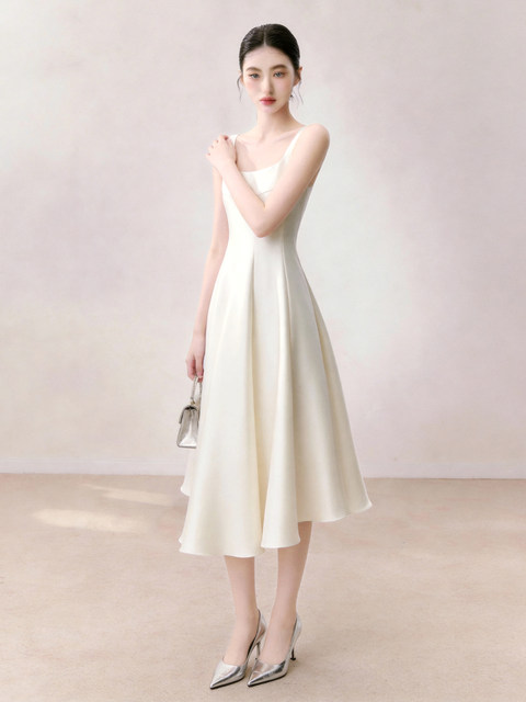 Elegant Sleeveless Suspender Dress 2026 Summer Waist-Cinching Slimming White Mid-Length Dress with a High-End French Minimalist Style