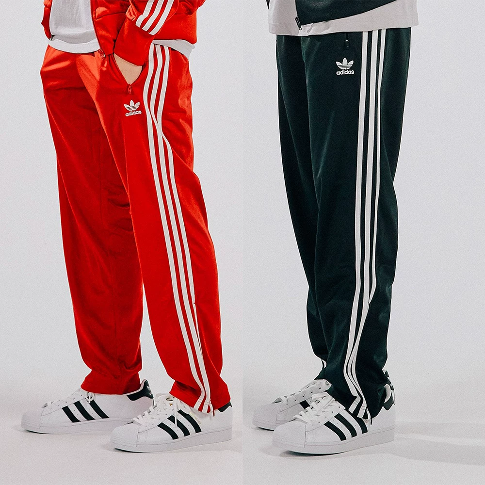 Красные и черные брюки Adidas для мужчин и женщин