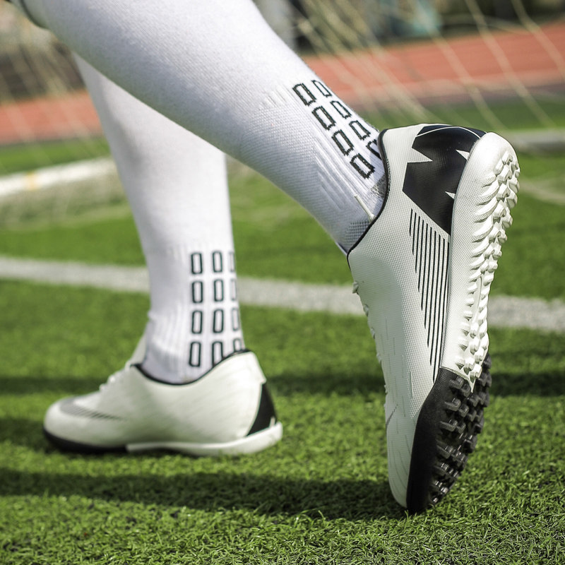 Soccer shoes men's broken nails adult students Ronaldo game AG spikes children Messi TF artificial grass training shoes