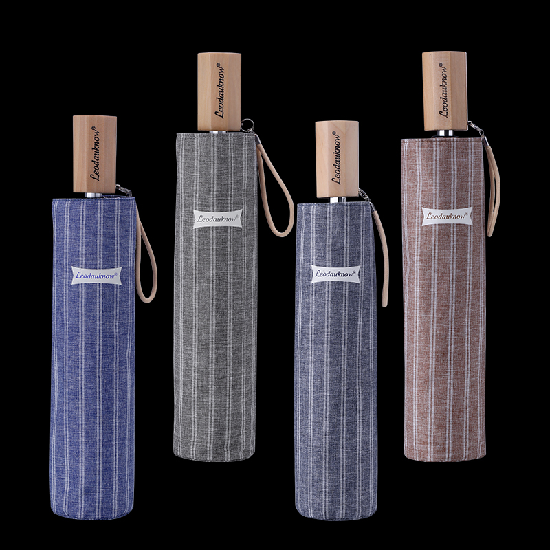 Leodauknow Japanese ultra-lightweight portable simple aluminum bone anti-wind men and women forest wooden handle three-folding sun umbrella