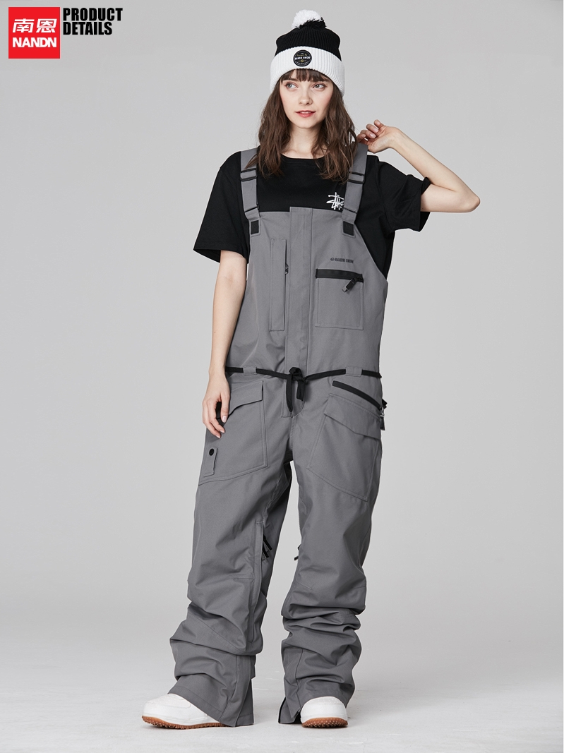 NANDN Korean version of the single board holding baby bag ski pants jumpsuit waterproof men's and women's snow pants jumpsuit wild snow wear-resistant