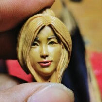 Hand-carved olive stone beauty head a very personalized pendant can be adapted to any theme