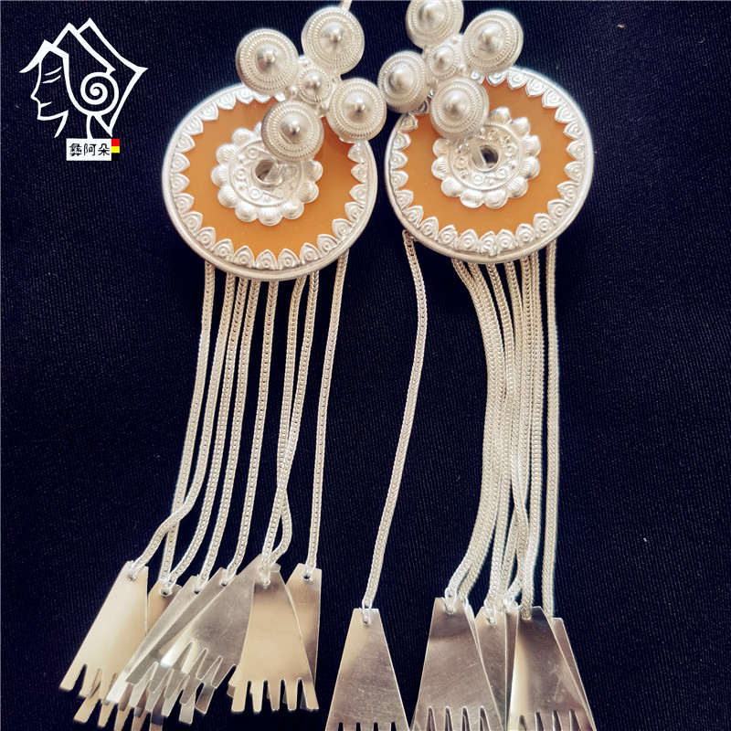 Yi Adol Liangshan Yi earrings female shells silver pure silver pure handmade long flow Su exaggerated fancy earthen jewelry