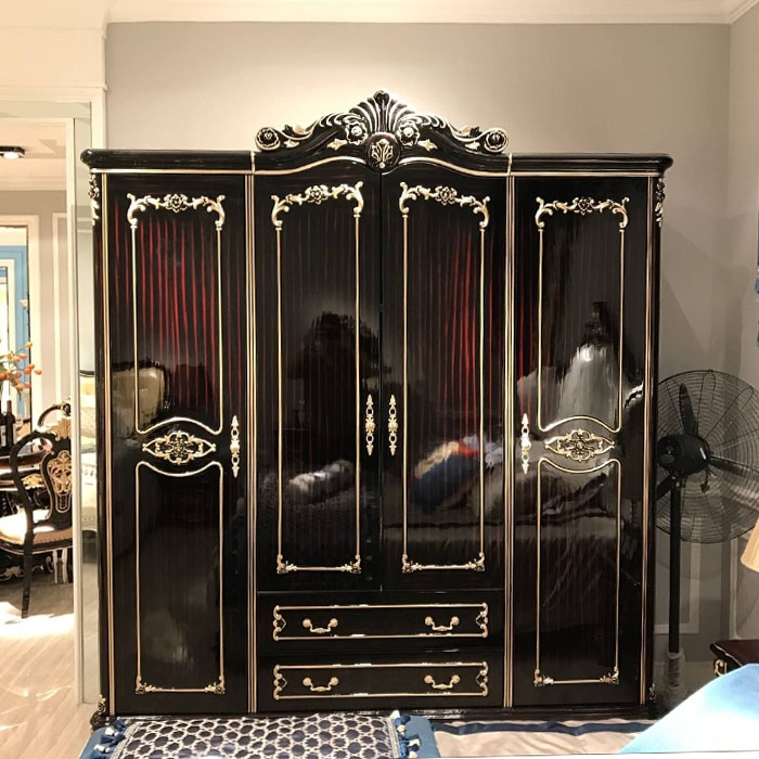 European-style all solid wood carved ebony storage large wardrobe gold-painted push handle four-door wardrobe wardrobe modern simplicity