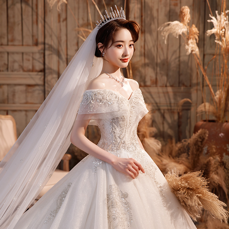 Elite wedding dress, french style, open shoulders, fitted