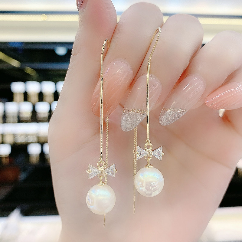 Design Sense Zircon Butterfly Knot Pearl Earrings Earrings Pendant Temperament Fashion 100 Hitch long version Face Slim