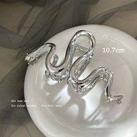 Змеино -образный зажим